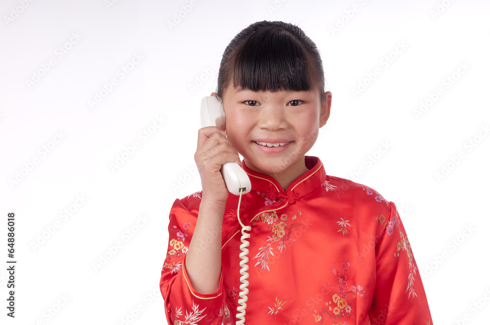 Make a phone call chinese girl in traditional Chinese cheongsam Make a phone call chinese girl in traditional Chinese cheongsam