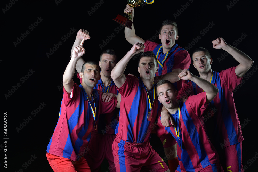 soccer players celebrating victory