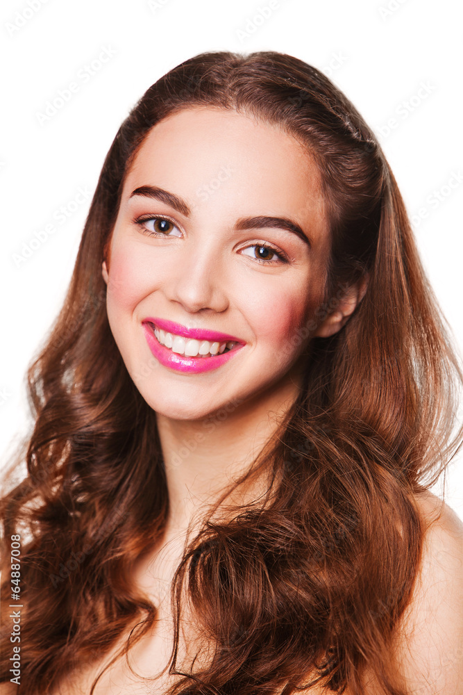 Portrait of Beautiful smiling Woman with pink lips looking at Portrait of Beautiful smiling Woman with pink lips looking at