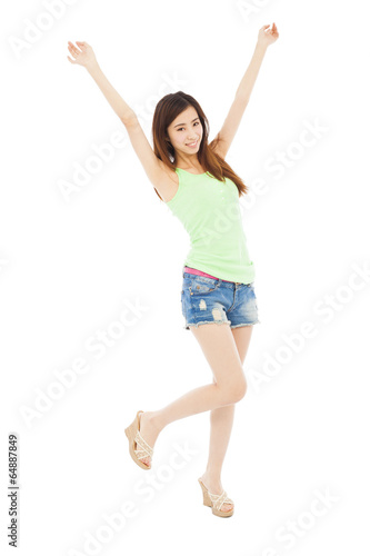 happy young woman student standing and raise arms