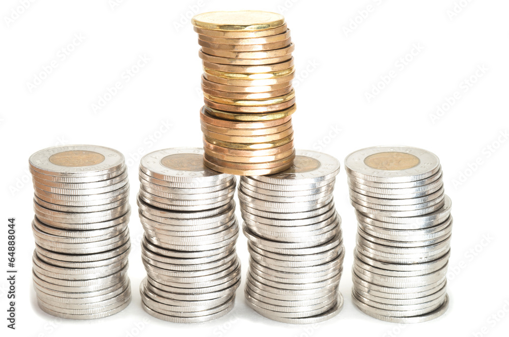 Silver and brass coins stack on white background Silver and brass coins stack on white background