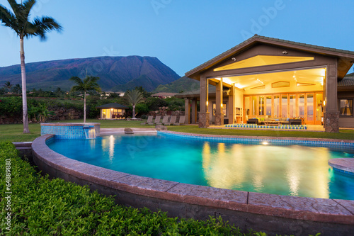Luxury home with swimming pool at sunset © EpicStockMedia