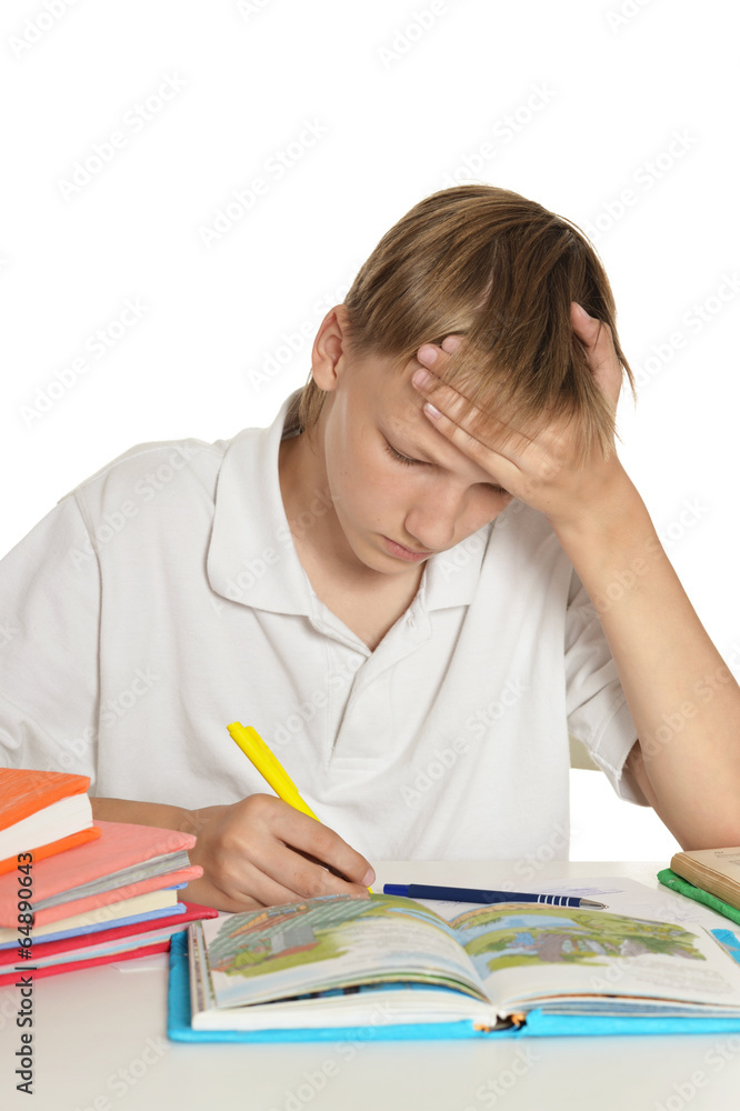 Boy is doing homework