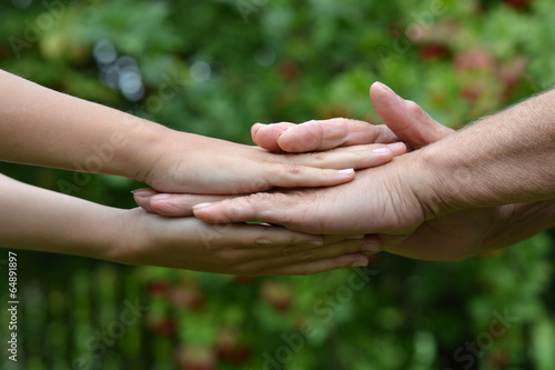 Hands held together © aletia2011