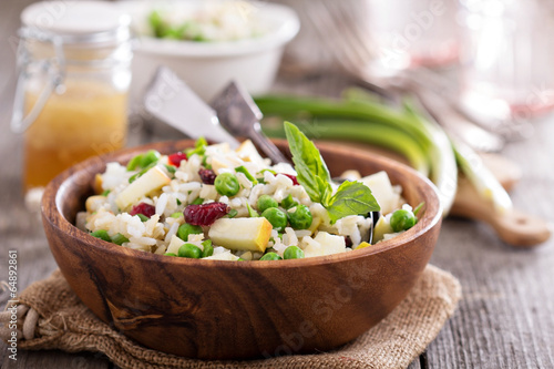 Salad with rice, apple, cranberry and peas
