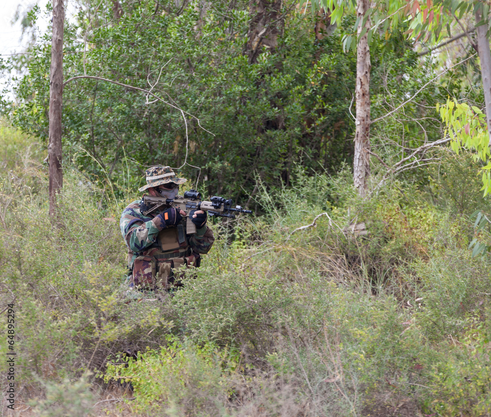 Fototapeta premium military weapons in the woods