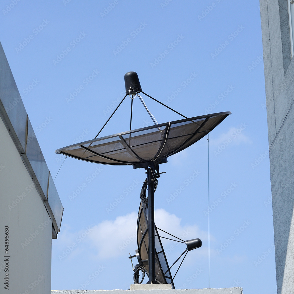 Single satellite dish with blue sky Single satellite dish with blue sky