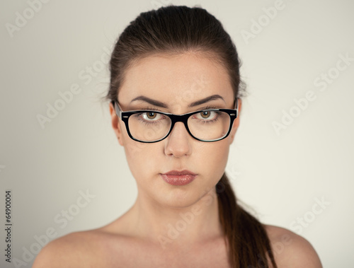 Close-up portrait of optician woman wearing spectacles