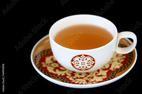 cup of tea on black background