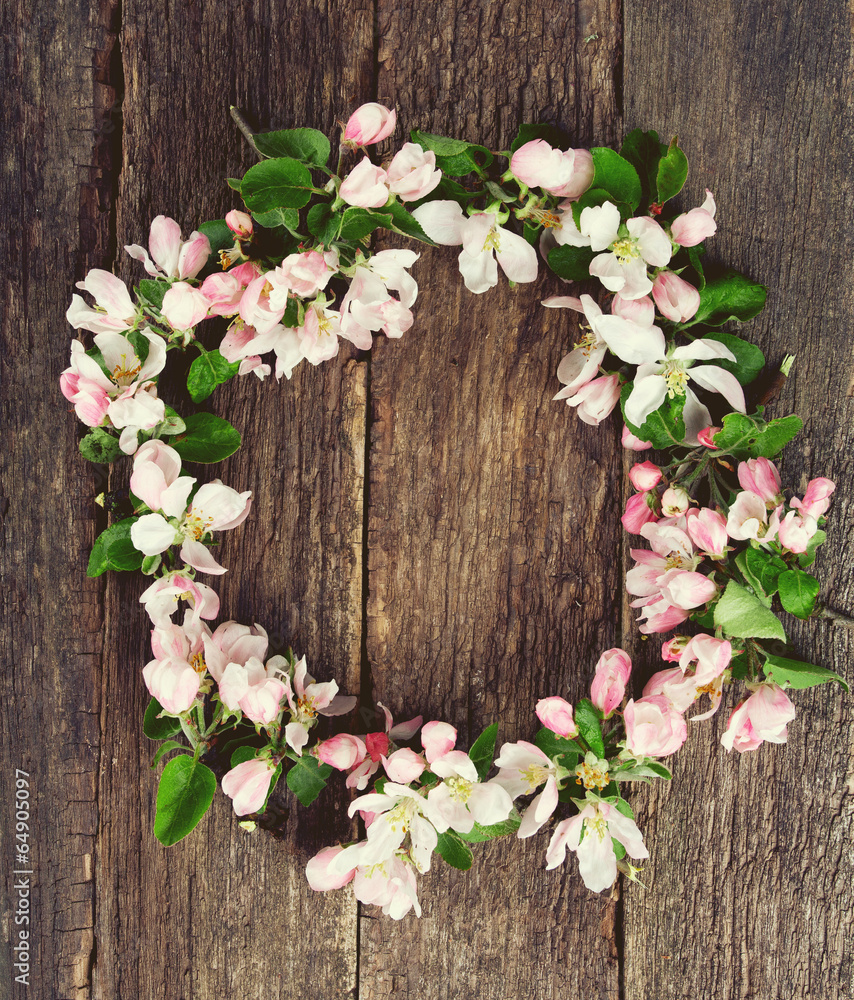 apple blossoms on wooden surface apple blossoms on wooden surface