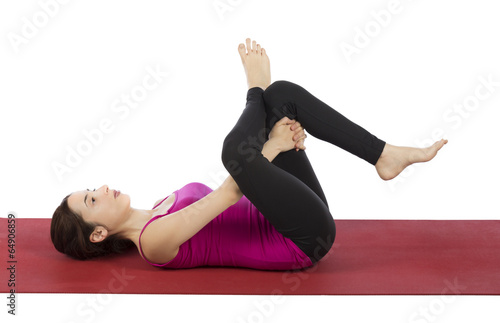 Woman doing Eye of the Needle Pose