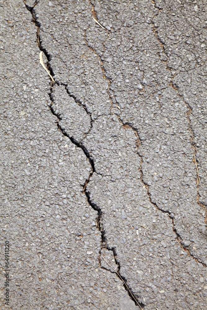 Fototapeta premium broken surface from local road in thailand