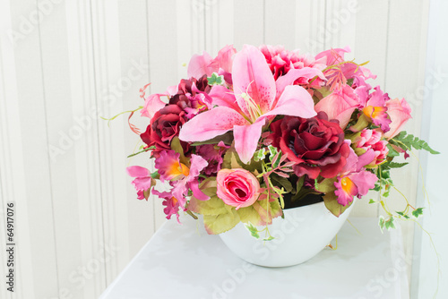 Artificial flowers in the basket