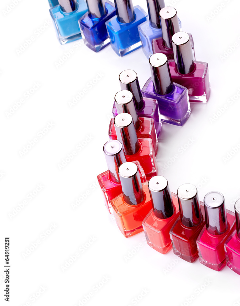 Naklejka premium Nail polish over white background