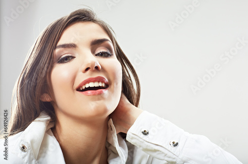 Woman face close up white backround isolated. Smiling girl port