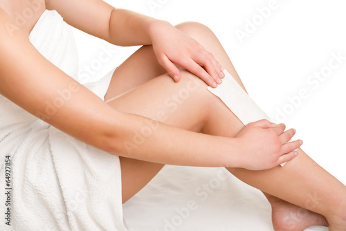 Woman Waxing Her Legs © ruigsantos