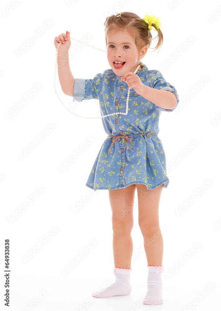 charming little girl playing and having fun. charming little girl playing and having fun.