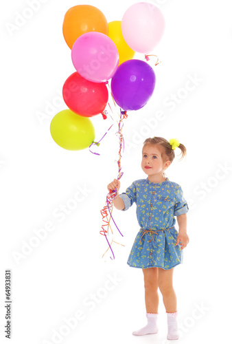 Charming girl with balloons. © lotosfoto