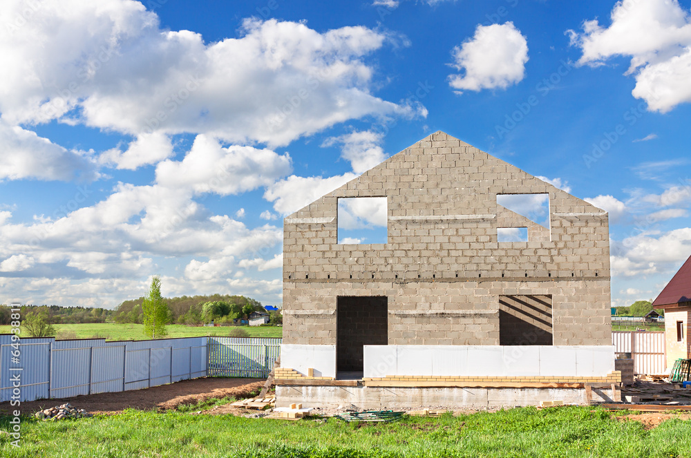 Obraz premium house construction from blocks and bricks