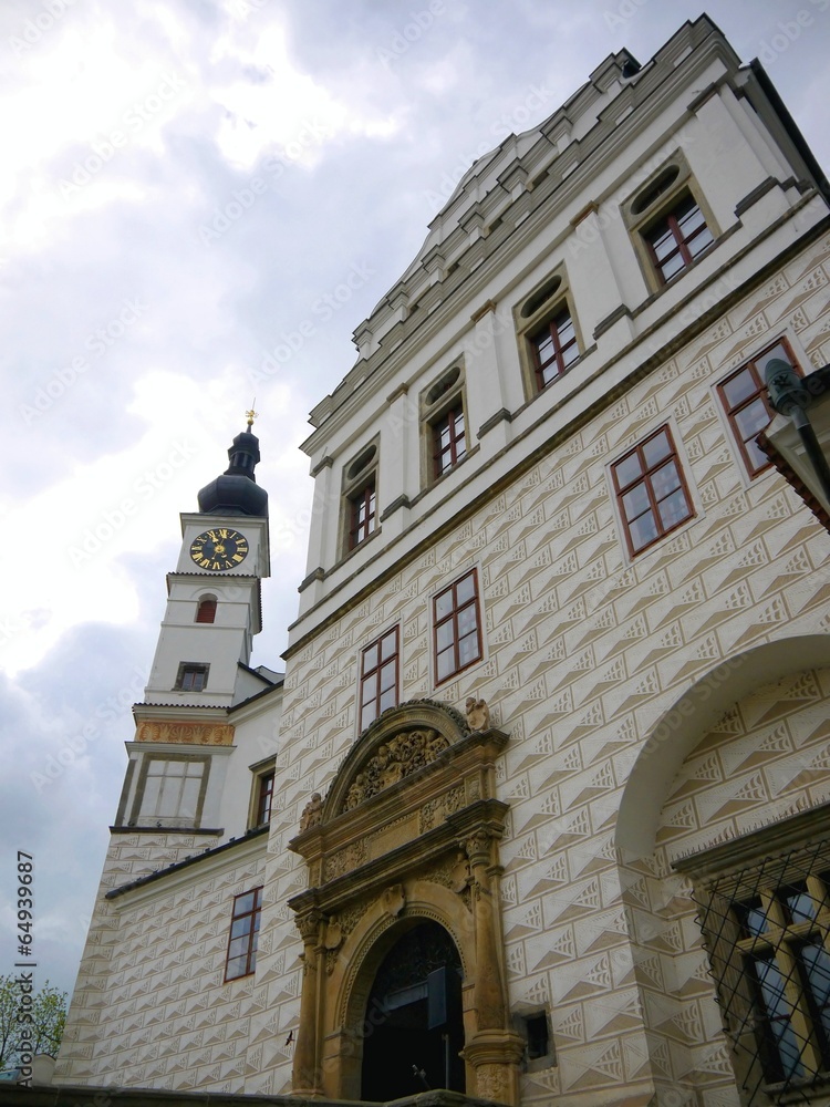 Front view of Pardubice castle with main gate and clock tower