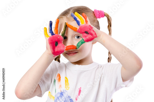 Portrait of a cute cheerful girl showing her hands painted in br