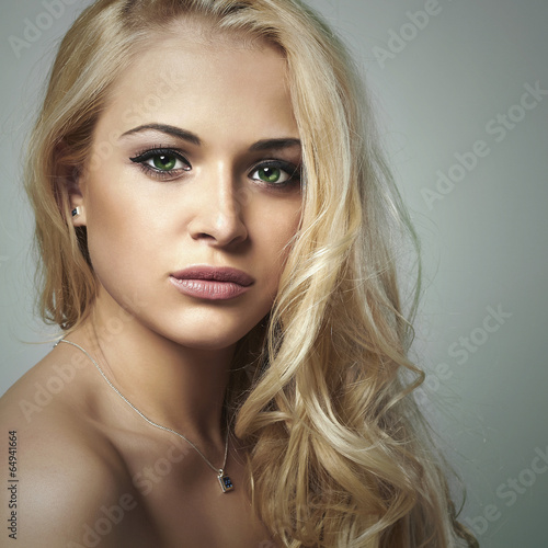 young woman.beautiful blond girl with green eyes.skin care