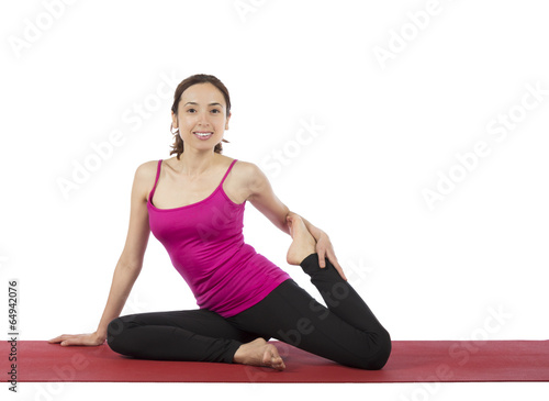 Young woman stretching her legs