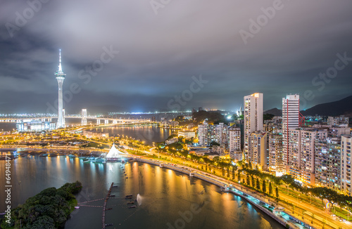 Macau  China. Aerial view of city buildings and tower at night