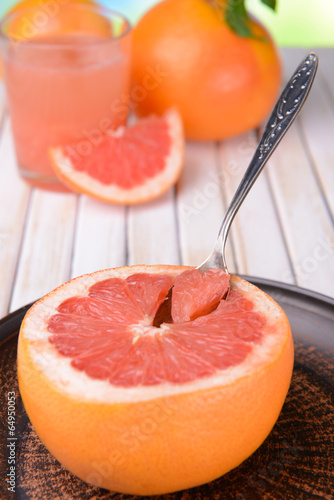 Ripe grapefruit on table close-up