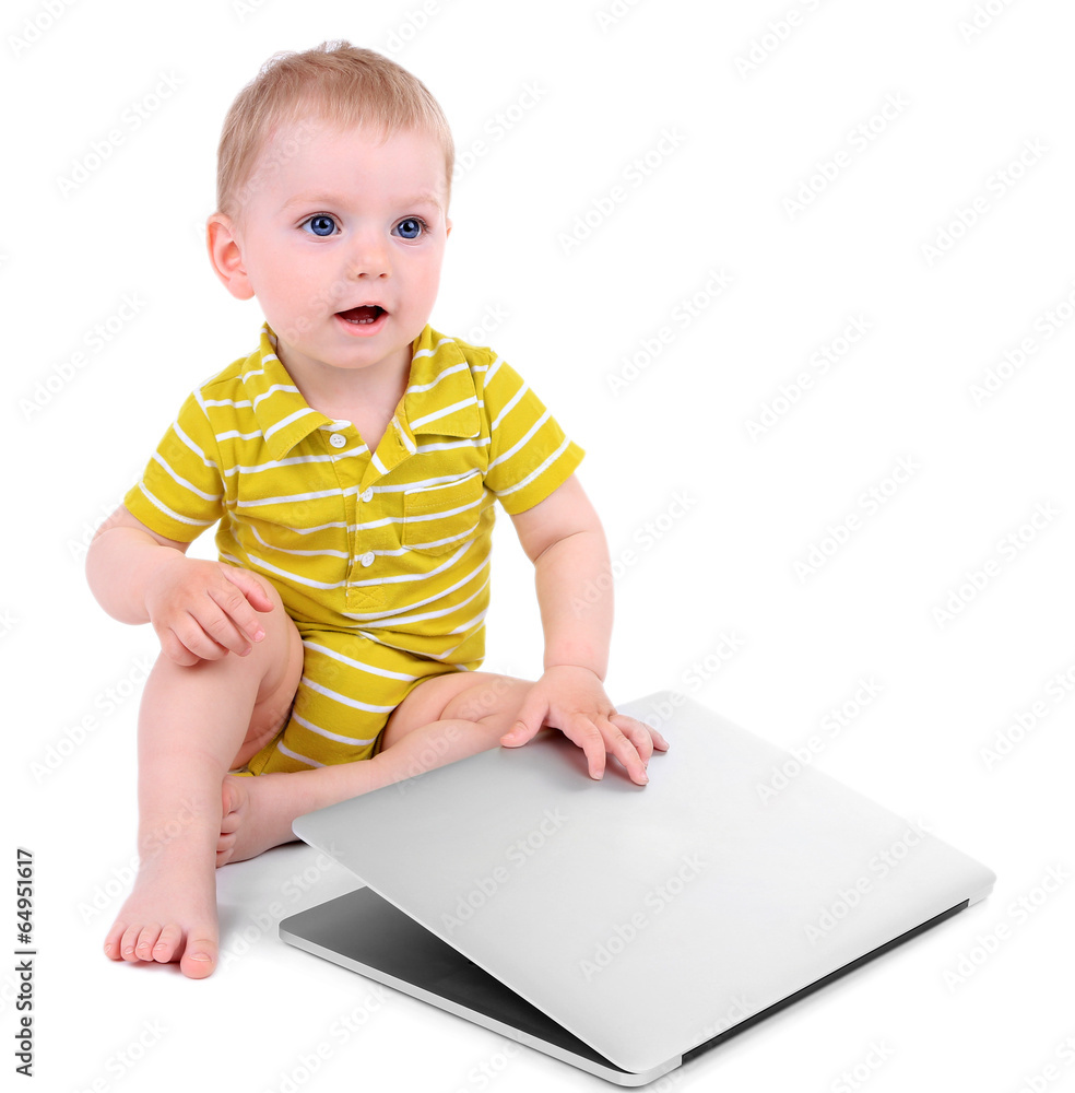 Cute little boy with laptop isolated on white Cute little boy with laptop isolated on white