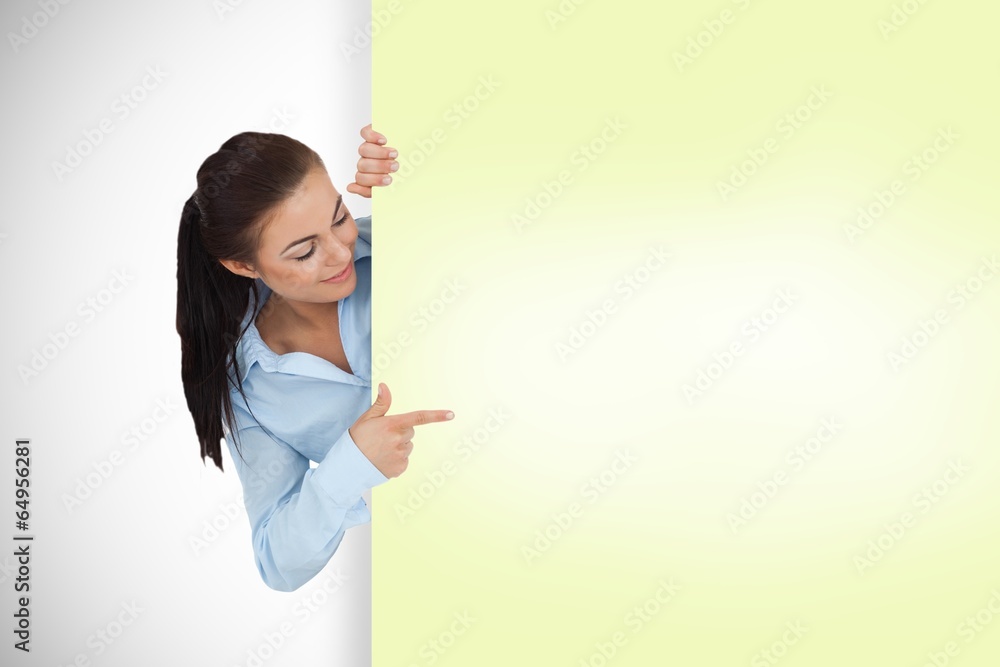 Composite image of businesswoman showing card Composite image of businesswoman showing card