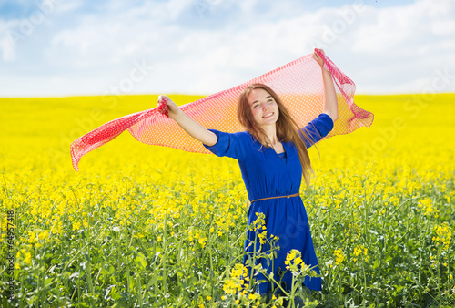 Girl in colza field