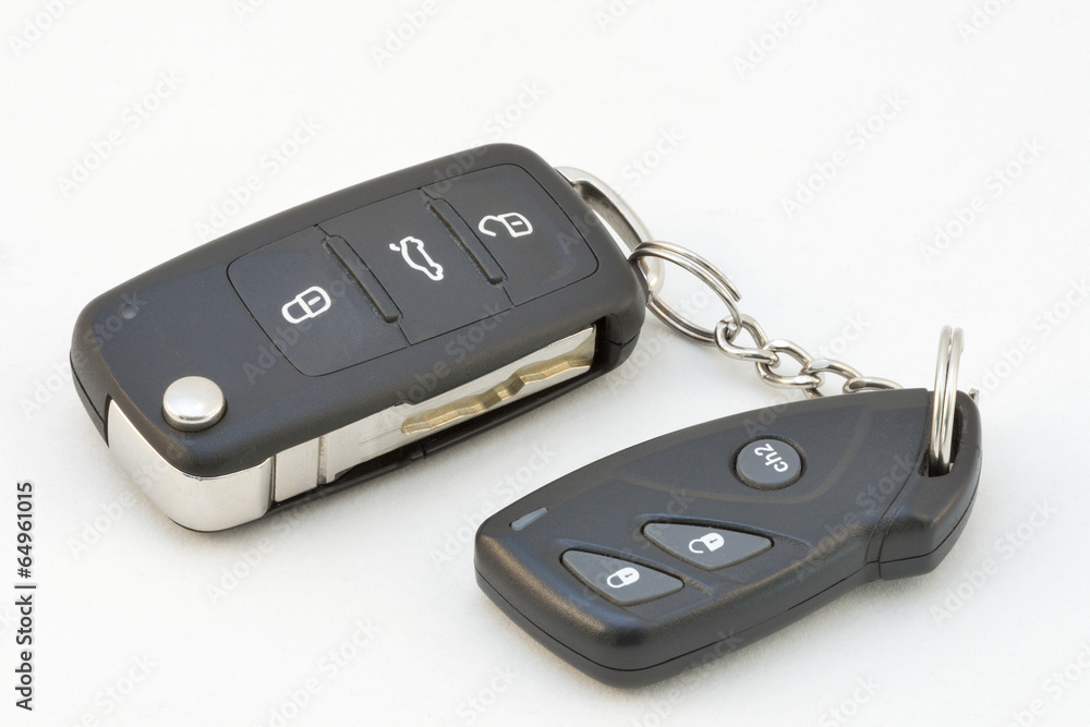 Modern Car Key and Remote on White Modern Car Key and Remote on White