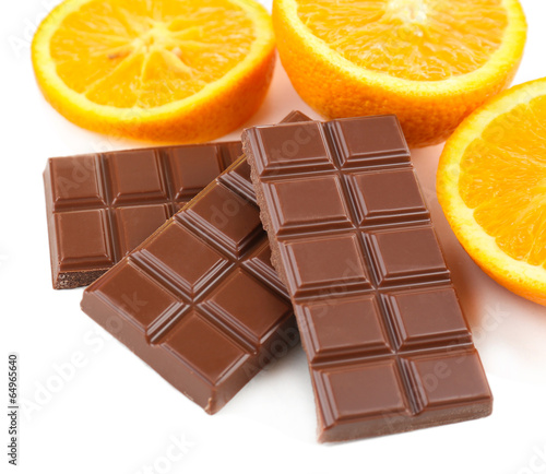 Chocolate and orange isolated on white