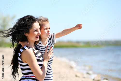 Happy mom and daughter. Wal...