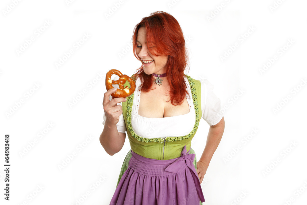 Young red head woman in traditional bavarian costume Young red head woman in traditional bavarian costume