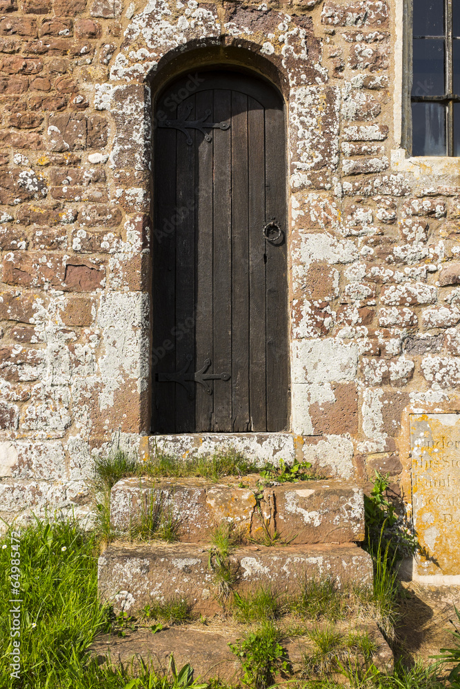 Side door, St Mary's church, Upton Hellions, Devon, England.