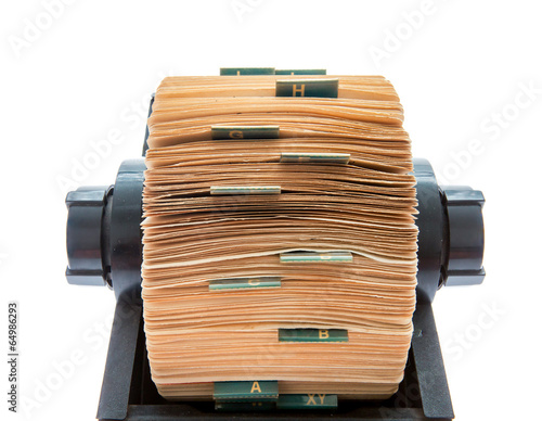 Old original rotary rolodex isolated on white photo