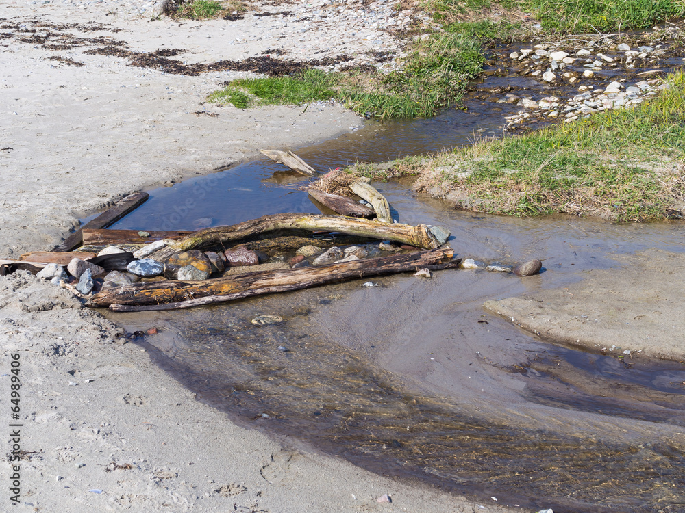 Fototapeta premium Small dam made by children