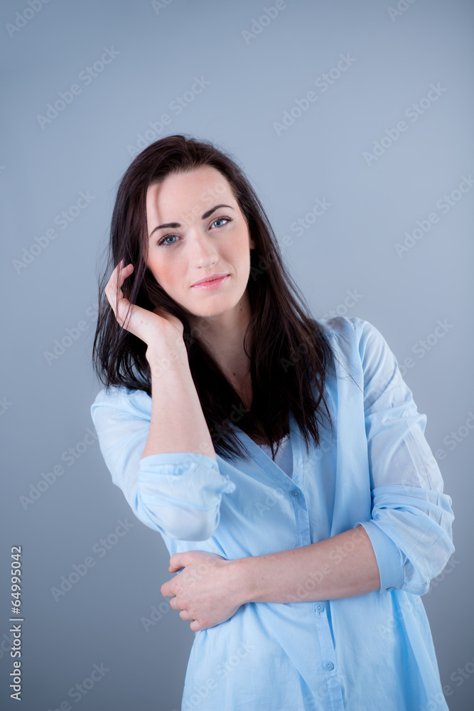 Isolated studio portrait of cheerful young woman Isolated studio portrait of cheerful young woman