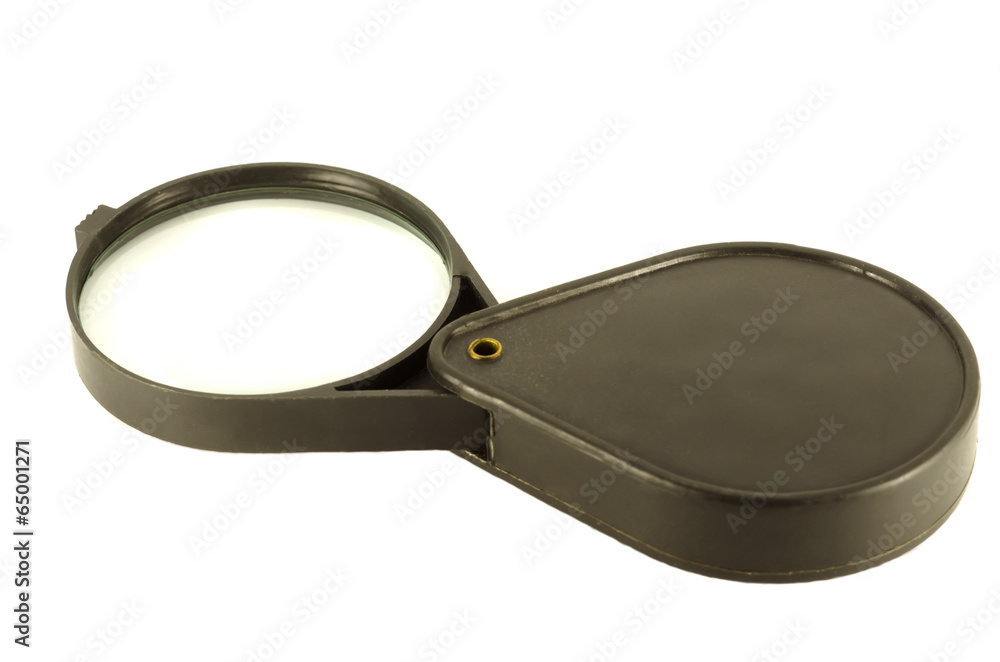 Folding magnifying glass, isolated Folding magnifying glass, isolated