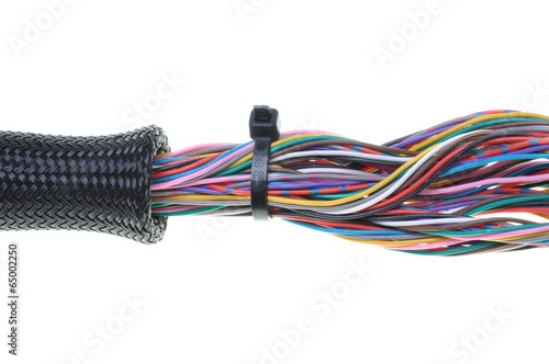 Protective pipe with cables isolated on white background 