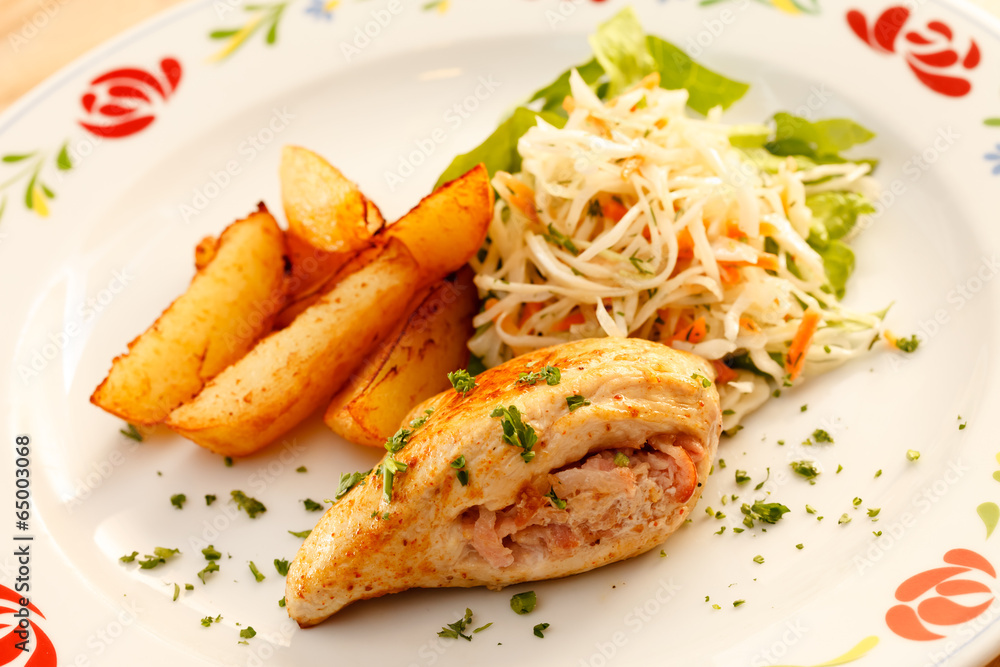 stuffed chicken breast with salad