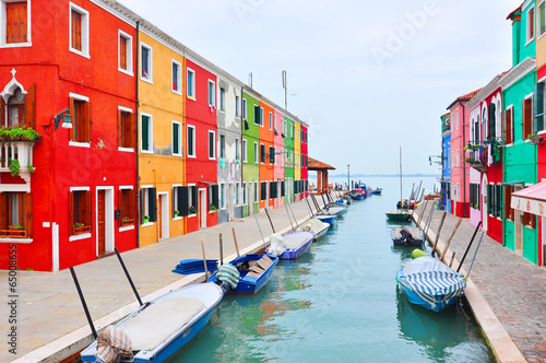 Burano island canal, colorful houses church. Italy. © Iaroslava Zubenko