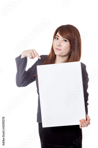 Asian businesswoman point to a vertical blank sign