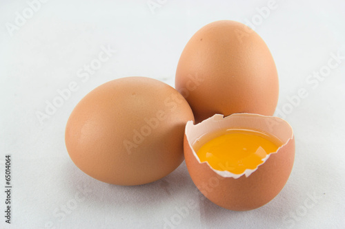 Broken egg isolated on white background