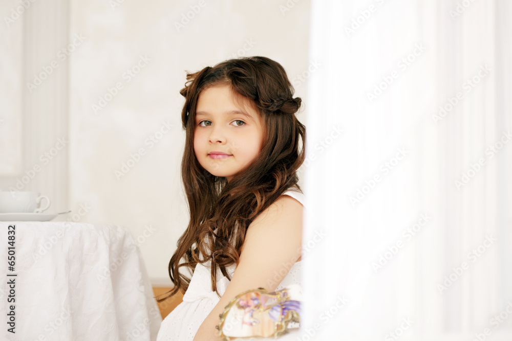 Portrait of cute brown-eyed girl with curly hair Portrait of cute brown-eyed girl with curly hair