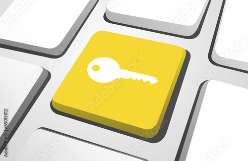 Yellow key computer icon on a keyboard button.