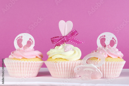 Three pink theme baby girl cupcakes