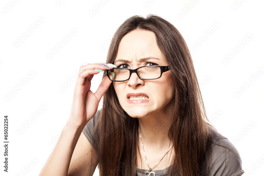 frowning woman with glasses